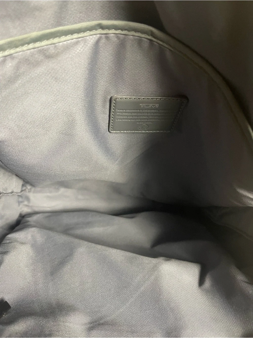Tumi Voyageur Halsey nylon Gray Backpack with leather Top Handles.